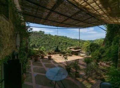 Foto Appartamento a Magliano in Toscana di 200 m² con 7 locali in vendita