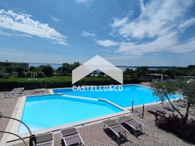 Foto Villa a schiera in Via del Pozzo, Moniga del Garda di 150 m²