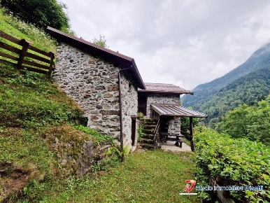 Foto Rustico in Località Bait de Paia, Paisco Loveno di 80 m² con 2 locali
