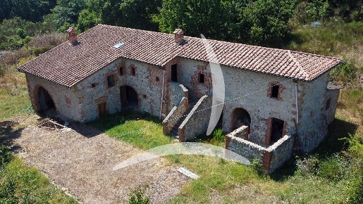 Foto Rustico a Torrita di Siena Montefollonico di 410 m² con 12 locali