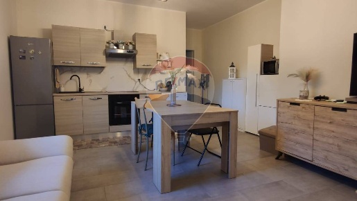 Foto Appartamento a Adrara San Martino Centro di 90 m² con 3 locali