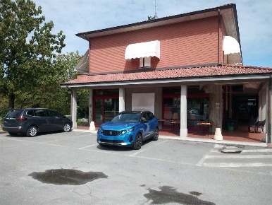Foto Negozio in Via Filippo Turati 31, Quattro Castella di 117 m²