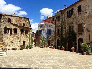 Foto Rustico in Località Poderi di Sotto, Manciano di 179 m² con 5 locali