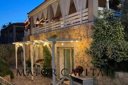 Foto Villa singola in Via Piave, Budoni Limpiddu di 300 m² con 11 locali