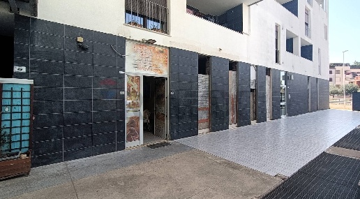 Foto Locale commerciale in Via Aiana 49, Elmas di 60 m² con 1 locali