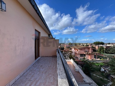 Foto Attico in Via Federico Zandomeneghi 37, Roma Acilia di 65 m²