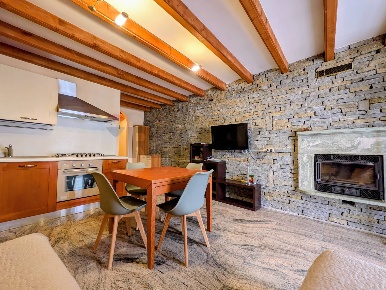 Foto Appartamento a Costa Volpino Centro di 113 m² con 3 locali in vendita