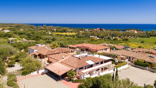 Foto Villa a schiera a Bari Sardo Torre Di Barì di 202 m² con 9 locali